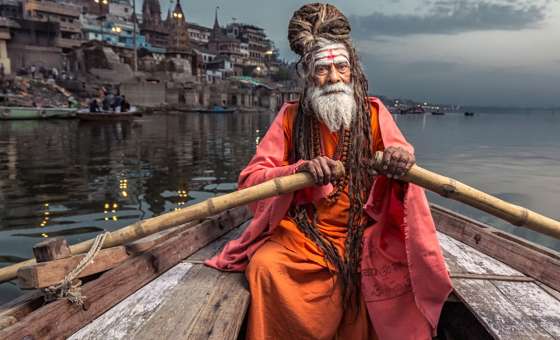 Holy Varanasi Man Ganges boat